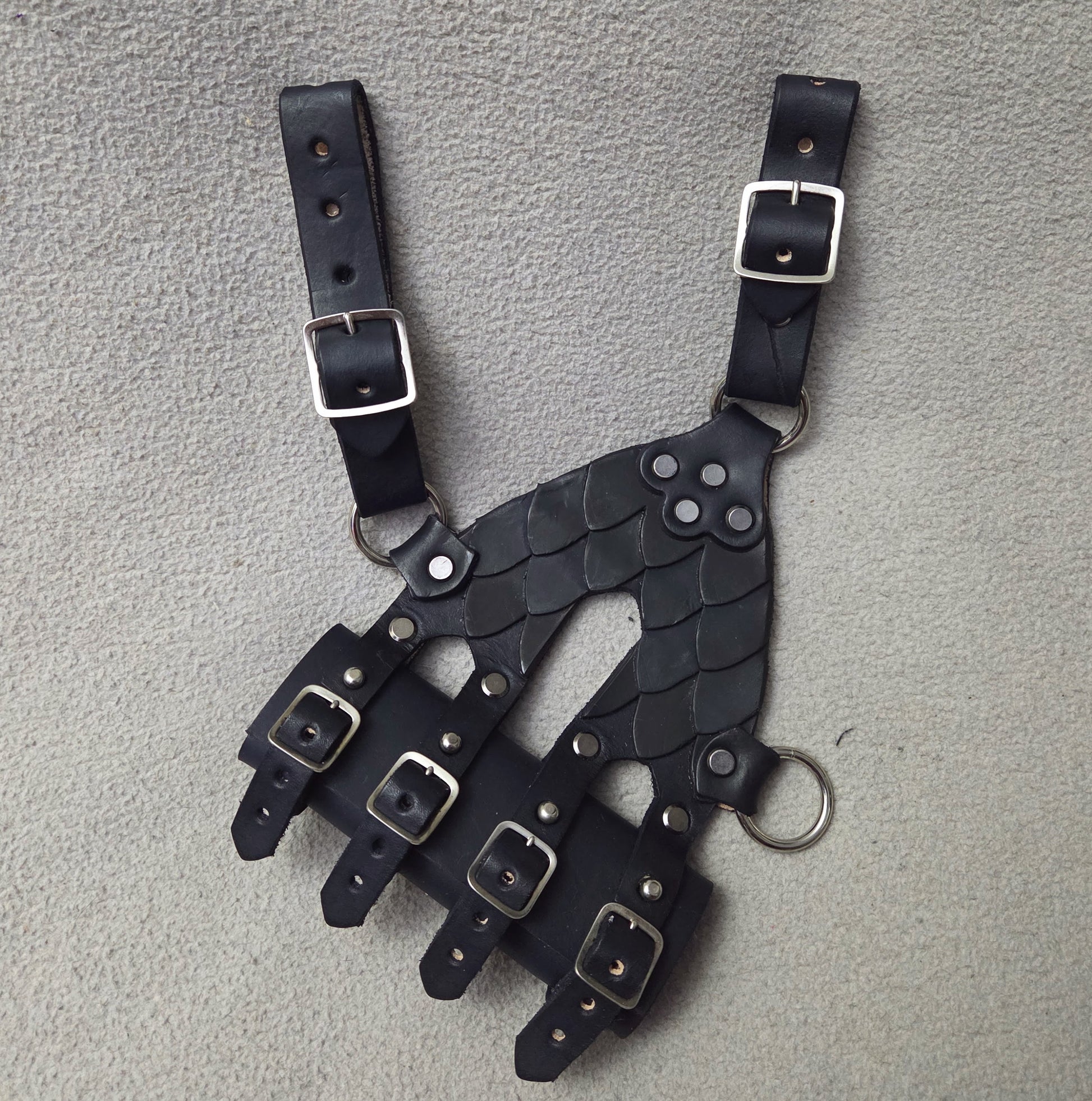 leather sword frog with scales on it